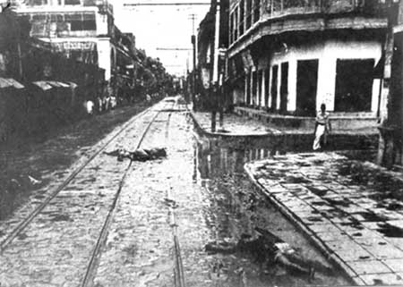 Communal riot in Calcutta. An unknown person was killed by rioters and his dead body lying on the tram line.jpg